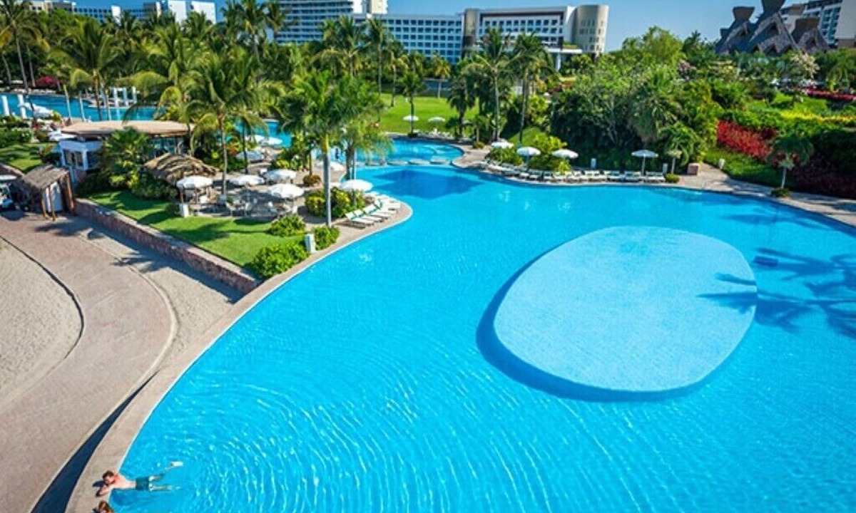 Villa Juarez Condo | Mayan Palace Pool- true work of art, series of connected Lagoons