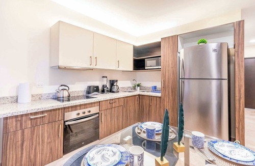 Gonzalo Guerrero Condo | 7 Min Beach Walk | Rooftop Pool with City Views
