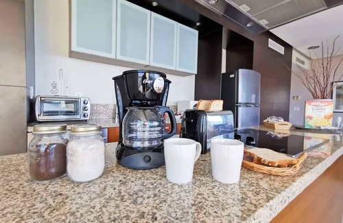 North Hotel Zone Condo | Beachfront Bliss, Gorgeous Pools in Peninsula bldg
