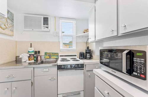 Treasure Island Condo | Beachfront Resort Suite With Heated Pool - Tropic Terrace Resort #56