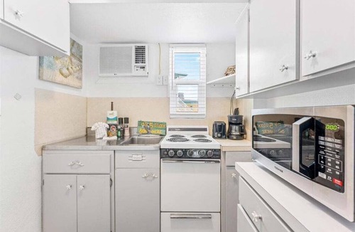 Treasure Island Condo | Beachfront Resort Suite With Heated Pool - Tropic Terrace Resort #56