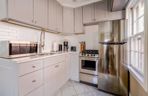 Georgetown House | Chic Georgetown 1BR w/W/D, nr Baseball, Bars & Dining, by Blueground