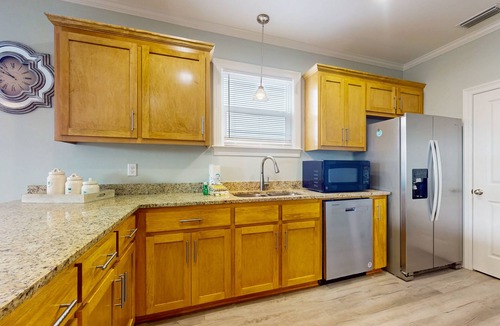 Audubon Place House | Gulfview duplex with loft, full kitchen, and washer and dryer.