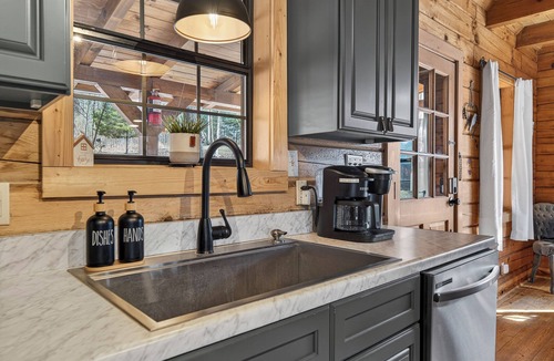 Milledgeville Cabin | Lakefront Escape w/Private Water Access, Dock, Kayaks, & Fire Pit. Pet Friendly!