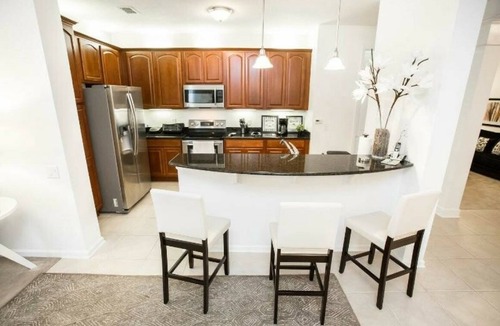 Florida Central Atlantic Coast House | Modern Vacation Apartment with a Lake View