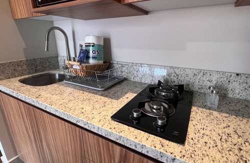 Benito Juarez Condo | New condo with roof top pool & fitness room, WiFi, 5 minutes from Romantic Zone
