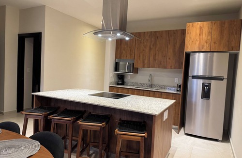 Puerto Juarez Condo | NEW! Modern 3BR Condo in Playa del Carmen - Pool, Terrace & Starlink WiFi