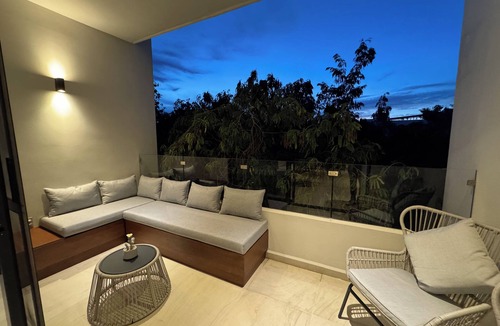 Puerto Juarez Condo | NEW! Modern 3BR Condo in Playa del Carmen - Pool, Terrace & Starlink WiFi