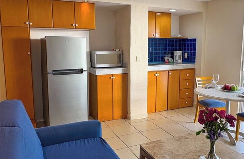 South Hotel Zone Condo | Partial View, WiFi and Hotel Amenities!