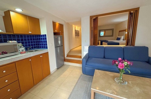 South Hotel Zone Condo | Partial View, WiFi and Hotel Amenities!