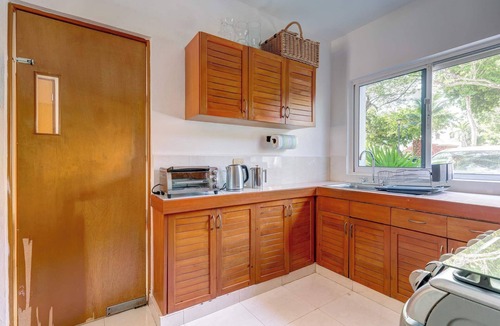 Playacar Condo | Poolside Family-Friendly Haven Near Golf & Beaches