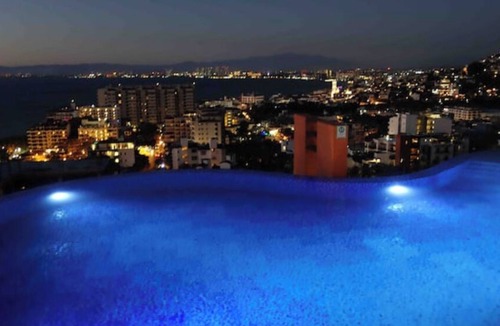 Romantic Zone Condo | Private Romantic Ocean View Haven with 40 foot Deck & Filtered Water