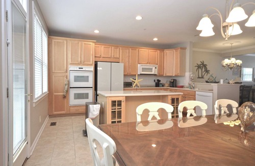 Sunset Island House | Splendid Luxury 5 Bedroom Townhouse with WiFi In Gated Community On Bayside With Indoor/Outdoor Pools, Private Beaches, Restaurant, And More Just Ten Minutes From Beach!