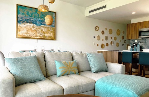 Playacar Condo | Stylish Playacar Condo · Spacious Balcony & Pool