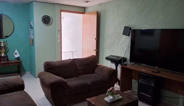 Comfortable and centrally located apartment with private office.