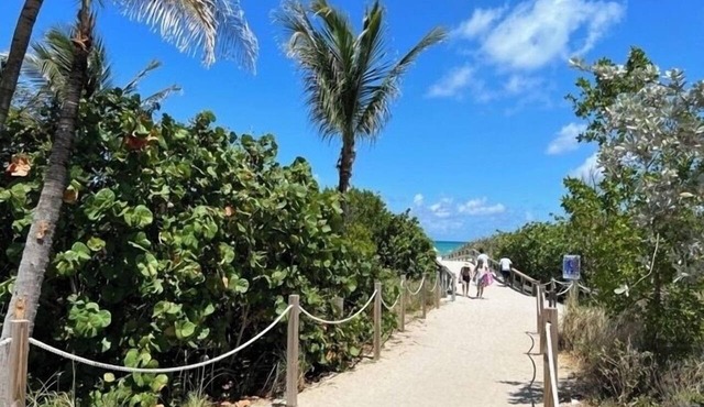 Updated & spacious 2-bedroom, 2 bath home walking distance to the beach.